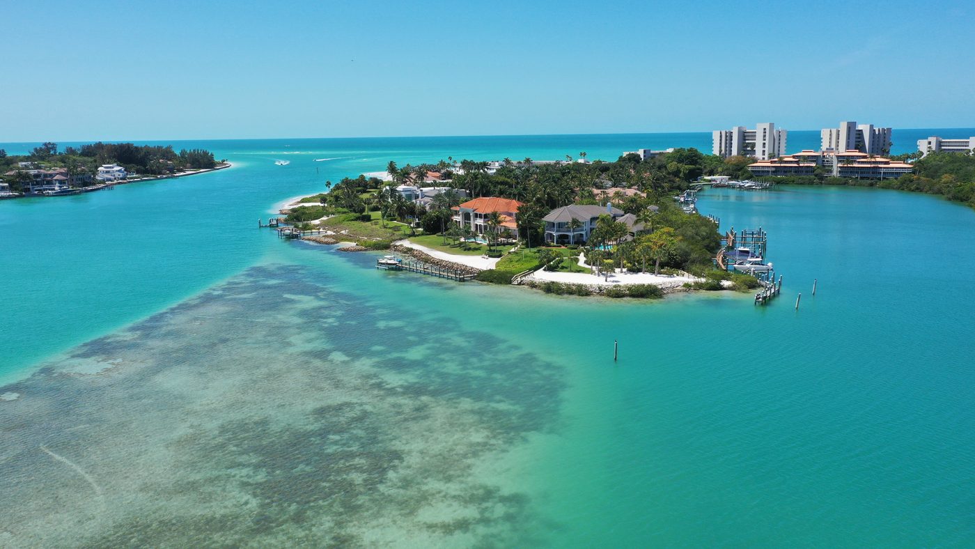 Aerial view of Gulf-front and bayfront estates on Longboat Key