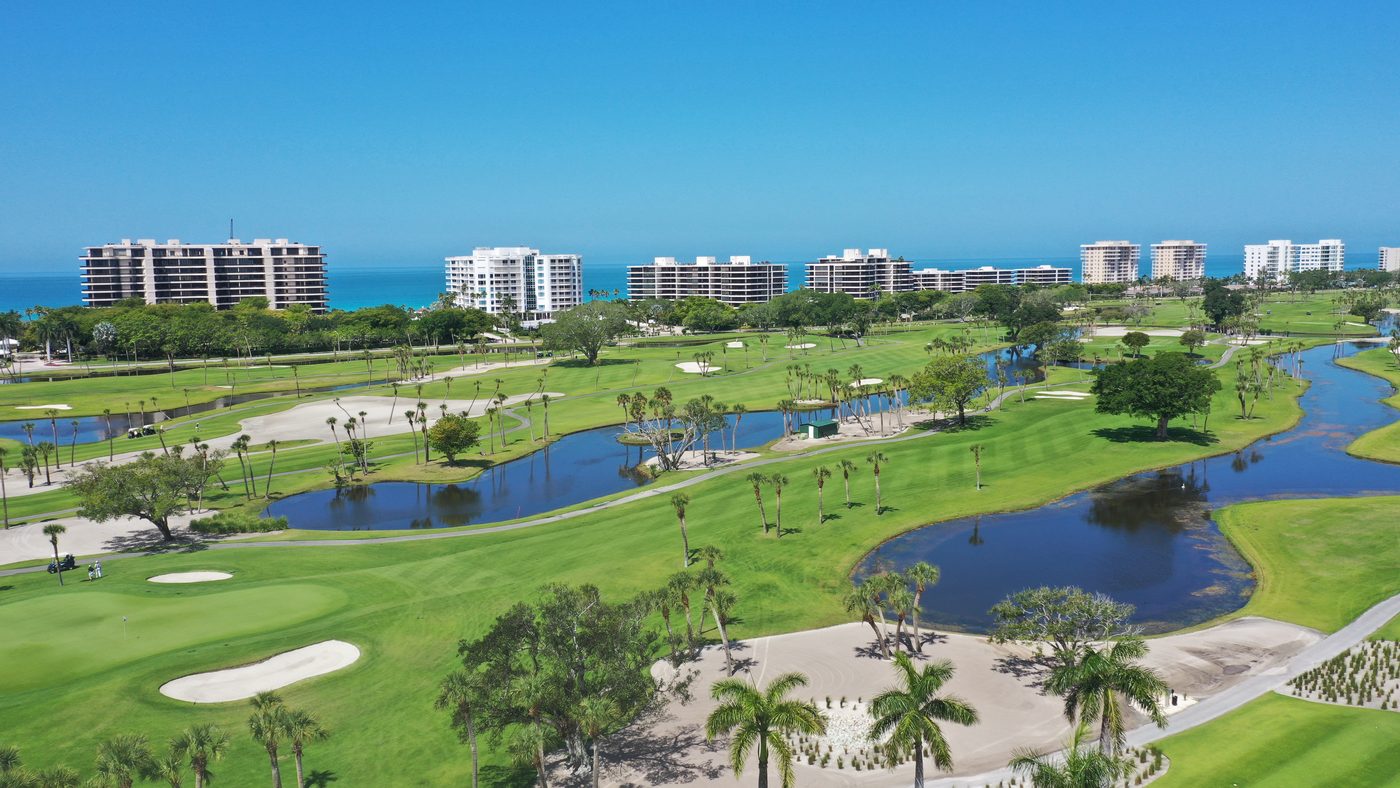 The Longboat Key Club championship golf course with Gulf-front towers beyond